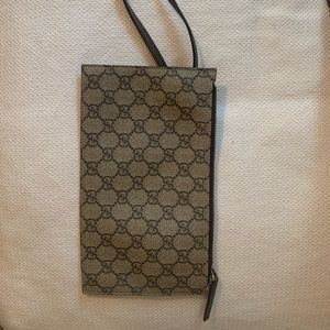 Gucci wristlet.